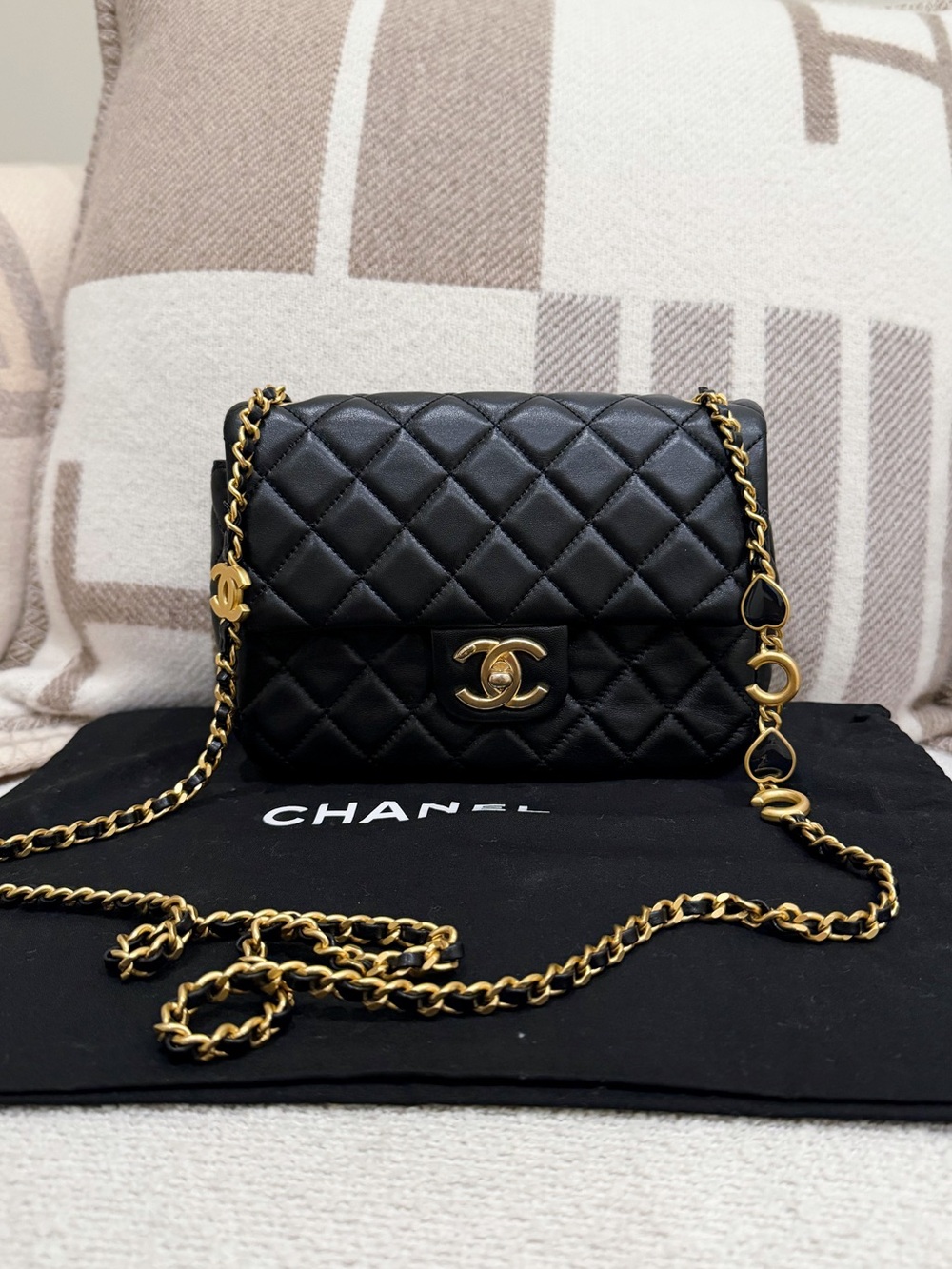 CHANEL 22K Coco Hearts Black Quilted Flap Crossbody with Gold Hardware